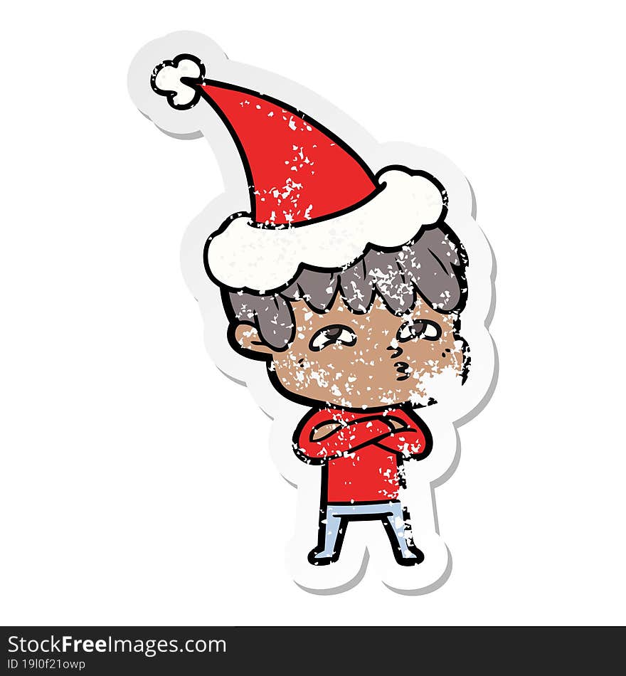 distressed sticker cartoon of a curious man wearing santa hat