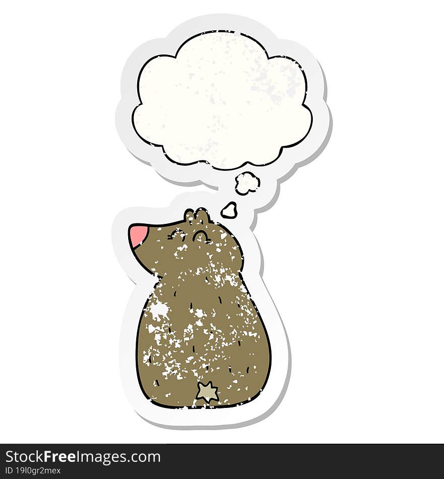 cute cartoon bear and thought bubble as a distressed worn sticker