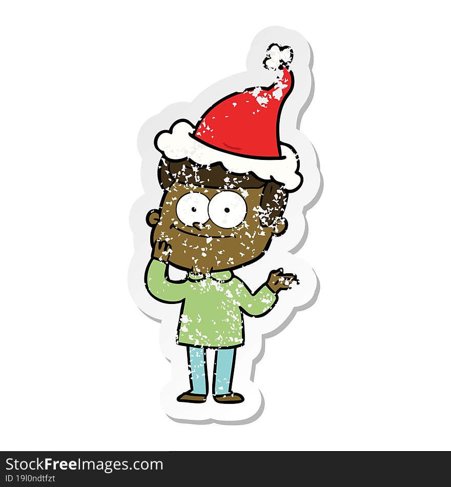 distressed sticker cartoon of a happy man wearing santa hat