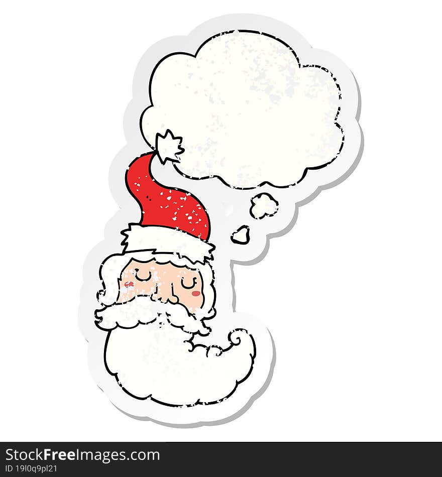 cartoon santa face with thought bubble as a distressed worn sticker