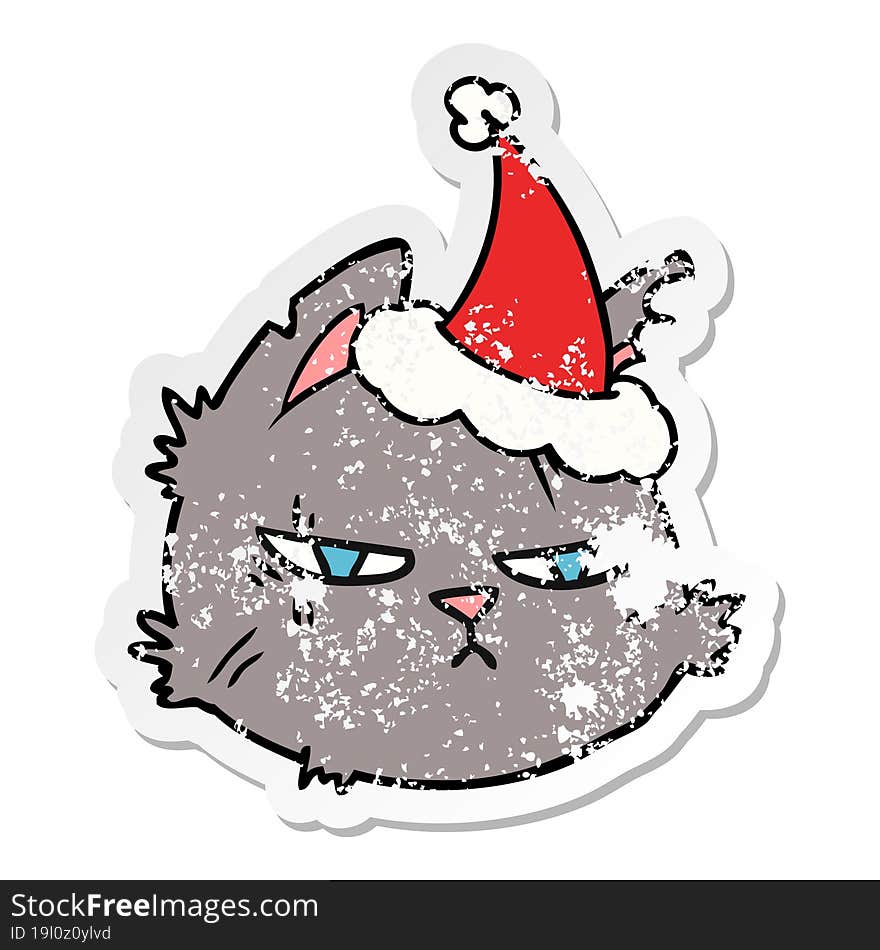 distressed sticker cartoon of a tough cat face wearing santa hat