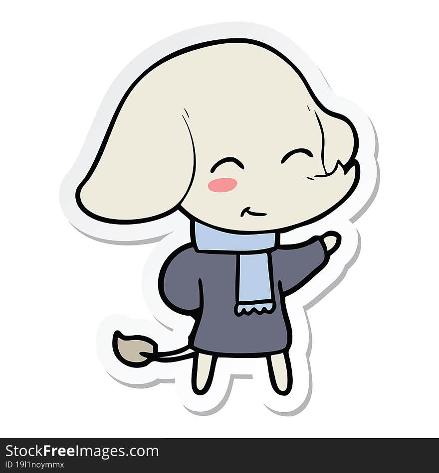 sticker of a cute cartoon elephant in winter clothes