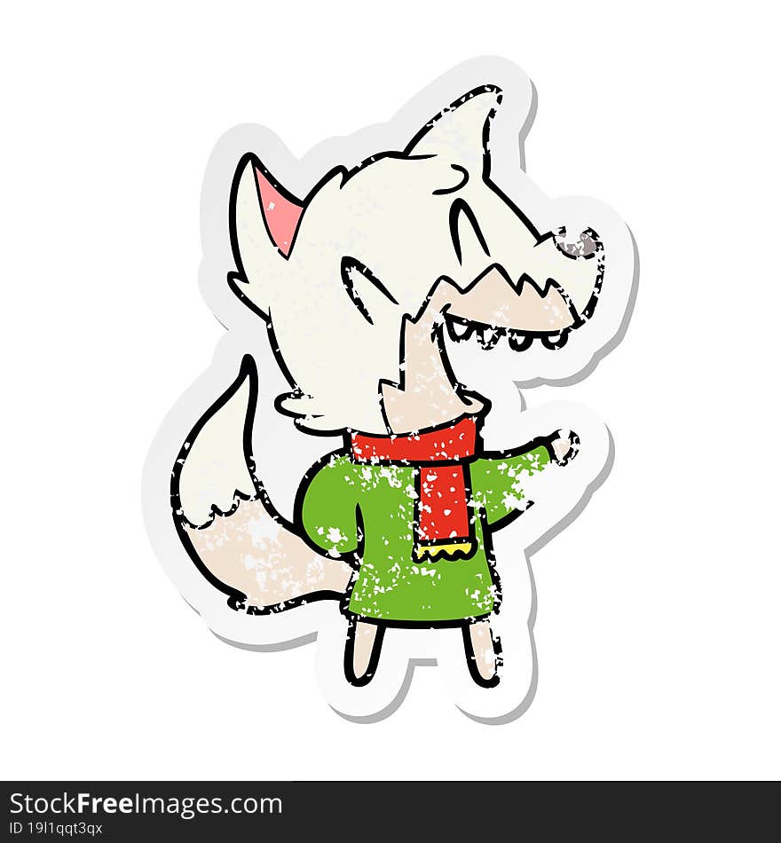 distressed sticker of a laughing fox wearing winter clothes