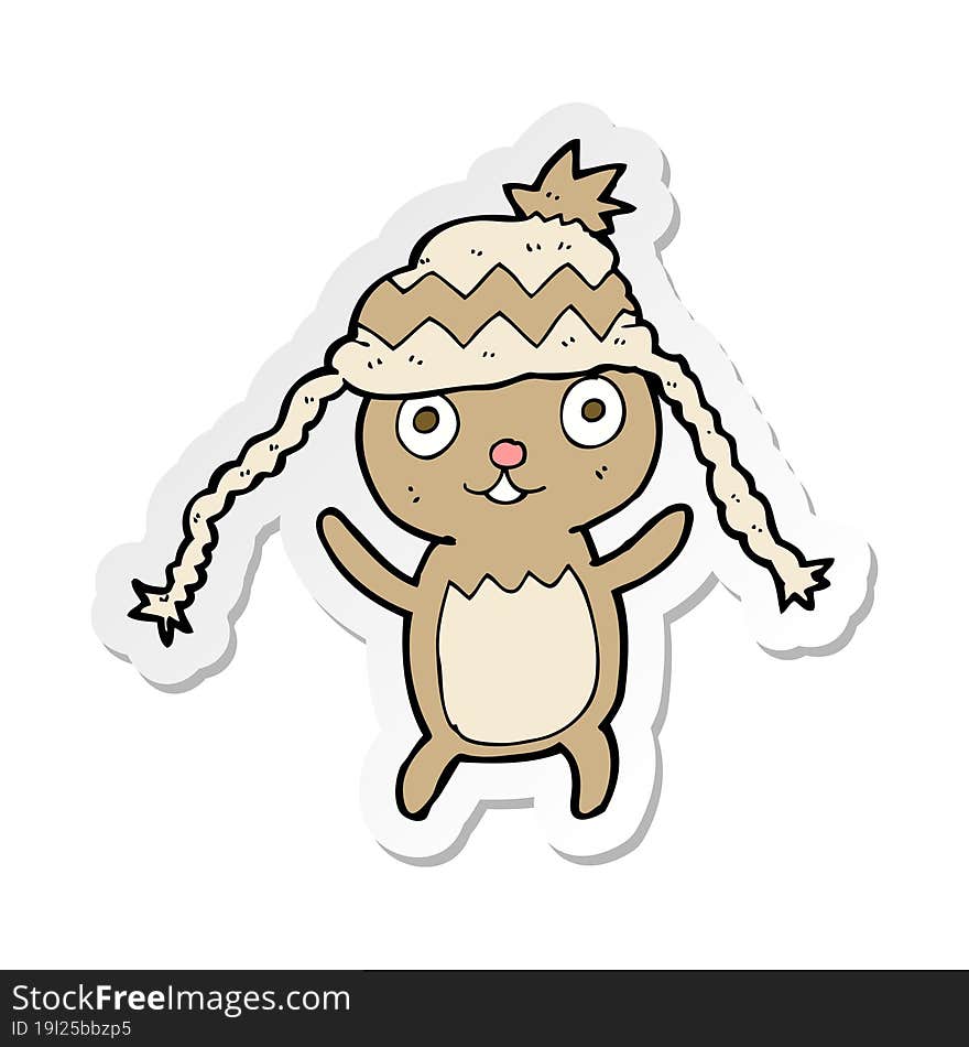 sticker of a cartoon bear in hat