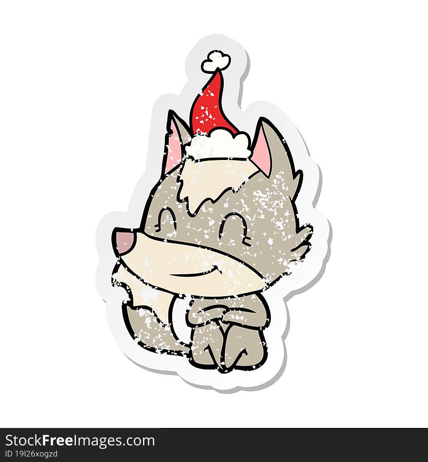 Friendly Distressed Sticker Cartoon Of A Wolf Wearing Santa Hat