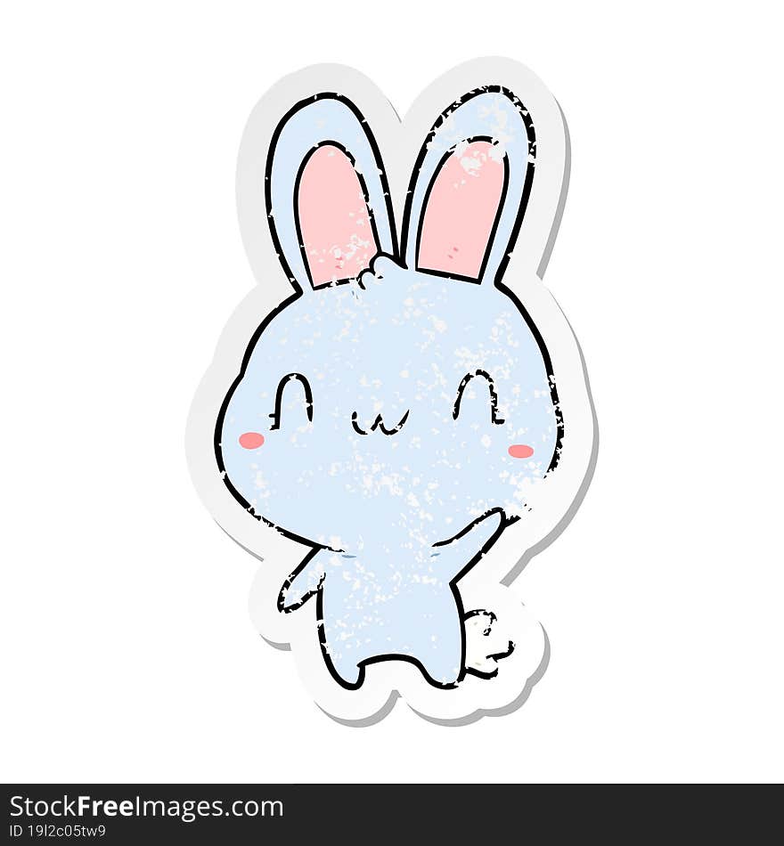 distressed sticker of a cartoon rabbit waving