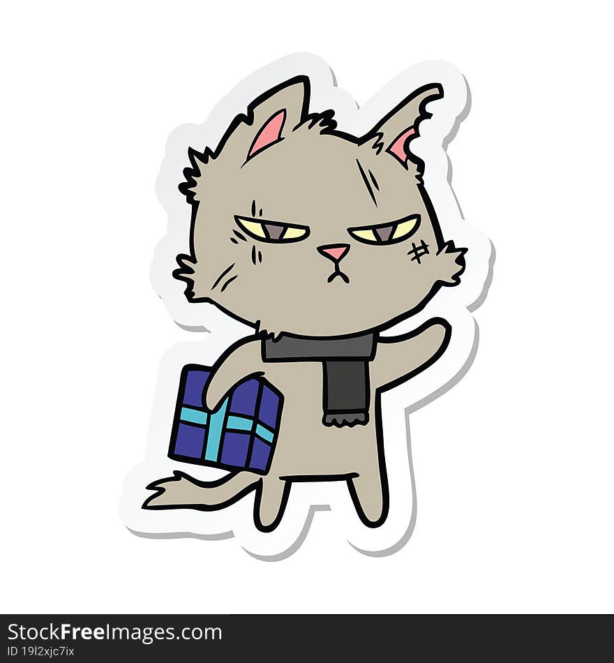 sticker of a tough cartoon cat with christmas present