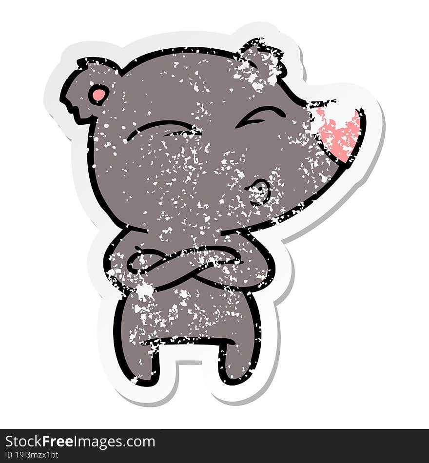 distressed sticker of a cartoon whistling bear