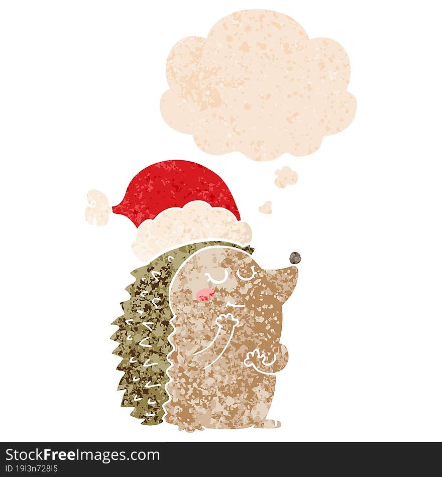 cartoon hedgehog wearing christmas hat and thought bubble in retro textured style