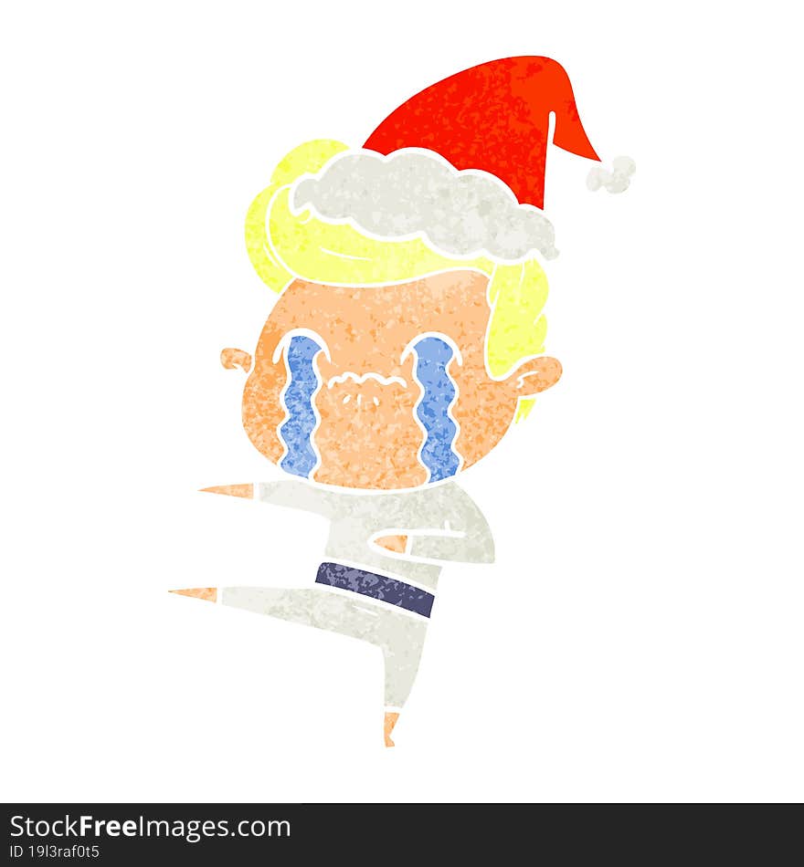 hand drawn retro cartoon of a man crying wearing santa hat