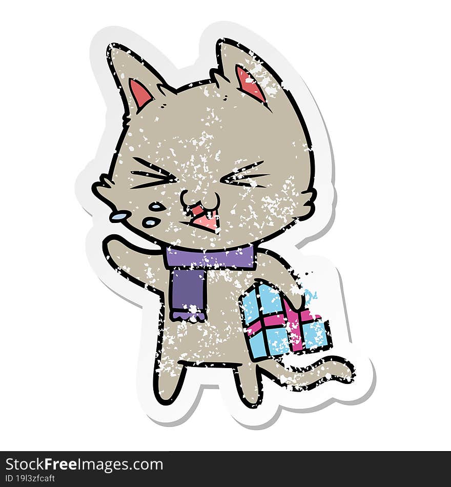 Distressed Sticker Of A Cartoon Hissing Cat With Christmas Present