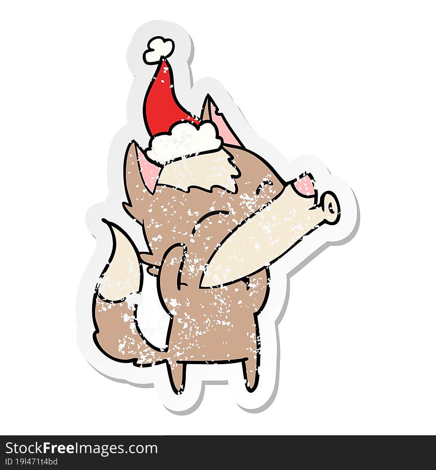 howling wolf distressed sticker cartoon of a wearing santa hat