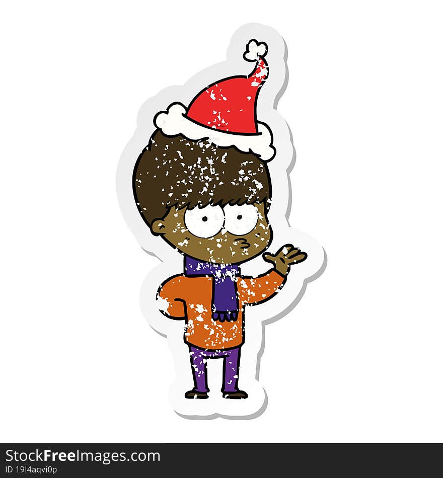 Nervous Distressed Sticker Cartoon Of A Boy Wearing Santa Hat