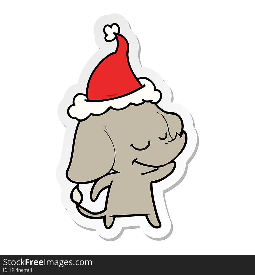 sticker cartoon of a smiling elephant wearing santa hat