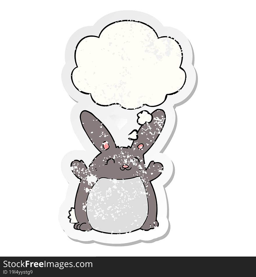 cartoon rabbit with thought bubble as a distressed worn sticker