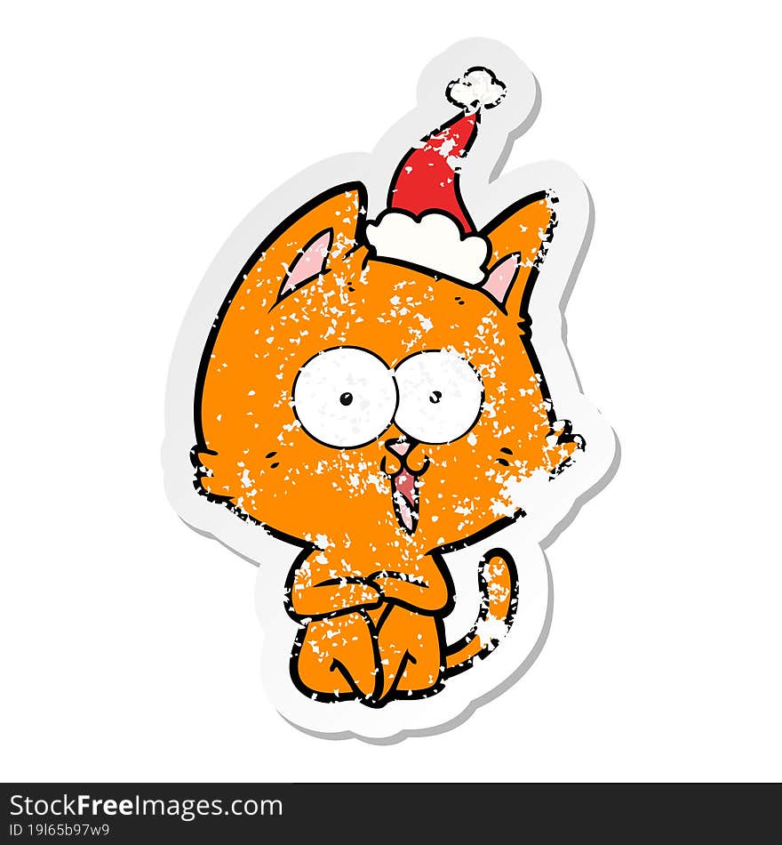 funny distressed sticker cartoon of a cat wearing santa hat