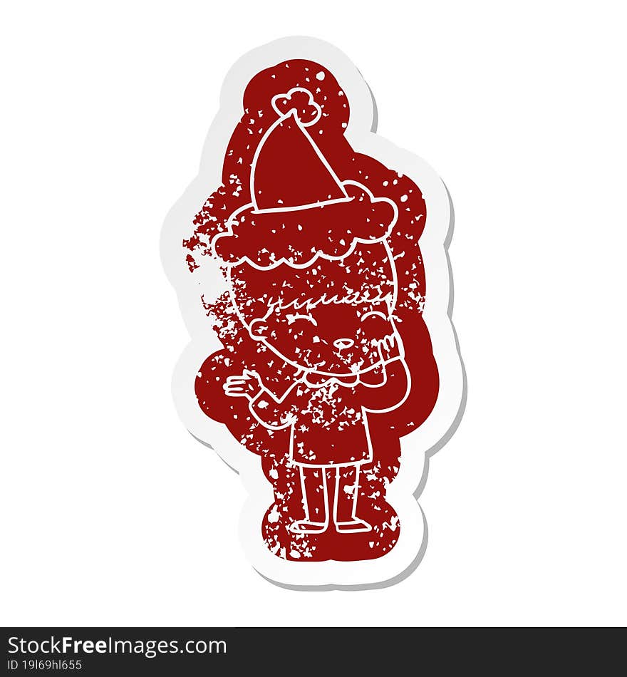 happy cartoon distressed sticker of a boy wearing santa hat