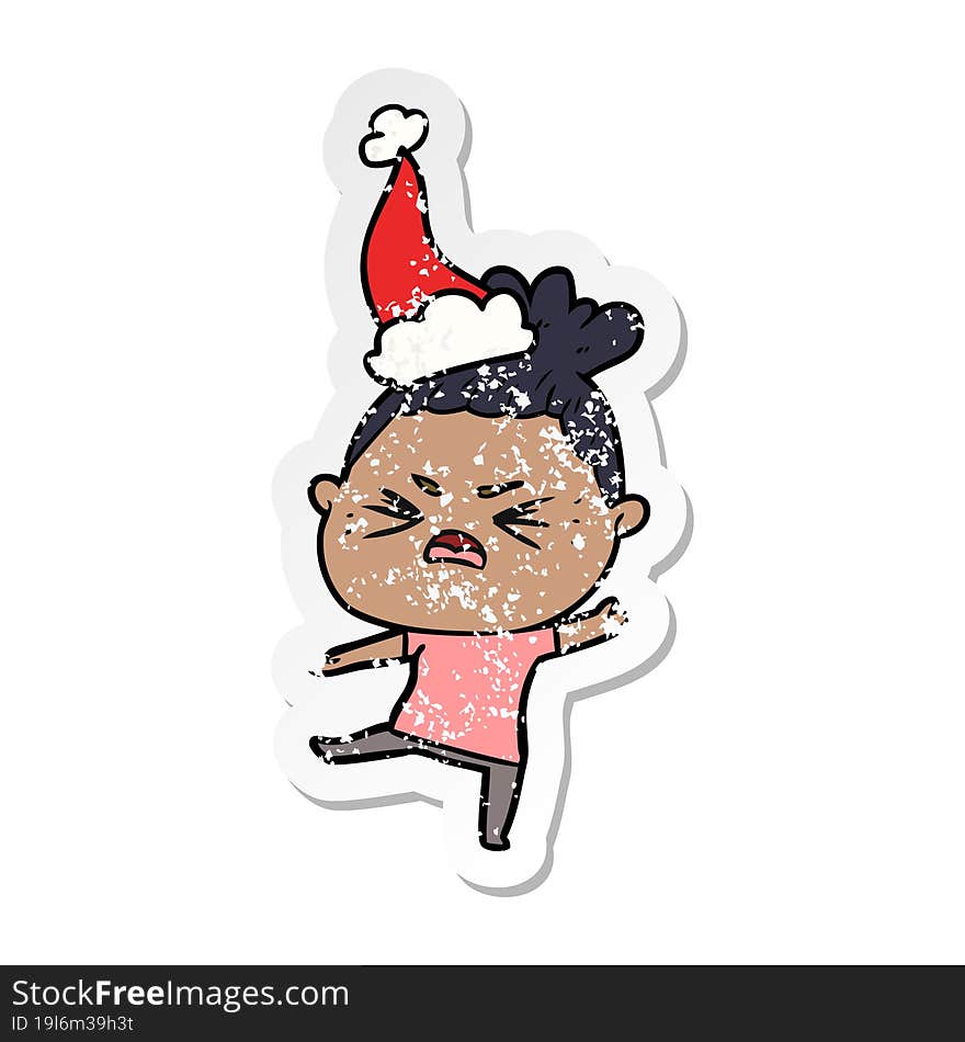 distressed sticker cartoon of a angry woman wearing santa hat