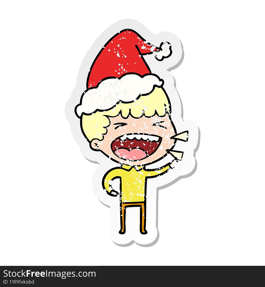 distressed sticker cartoon of a laughing man wearing santa hat