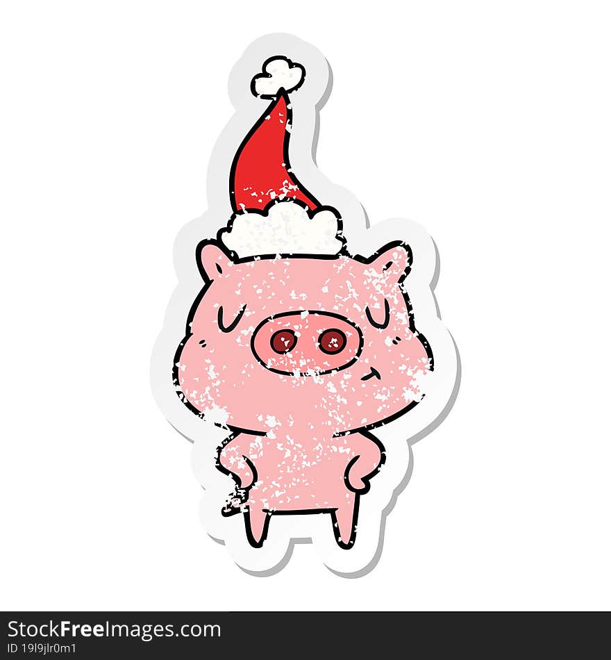 distressed sticker cartoon of a content pig wearing santa hat