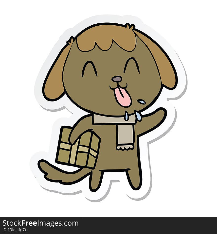 sticker of a cute cartoon dog with christmas present