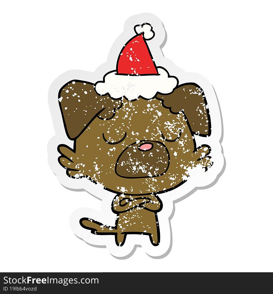 hand drawn distressed sticker cartoon of a dog wearing santa hat