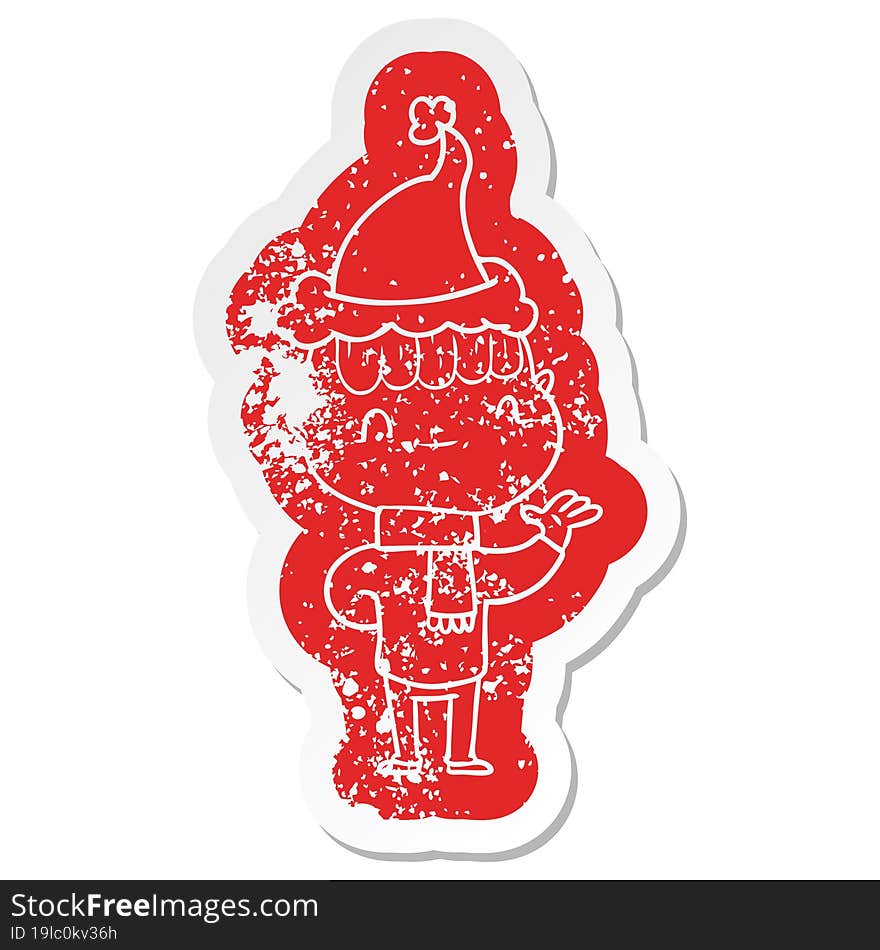 Cartoon Distressed Sticker Of A Friendly Boy Wearing Santa Hat