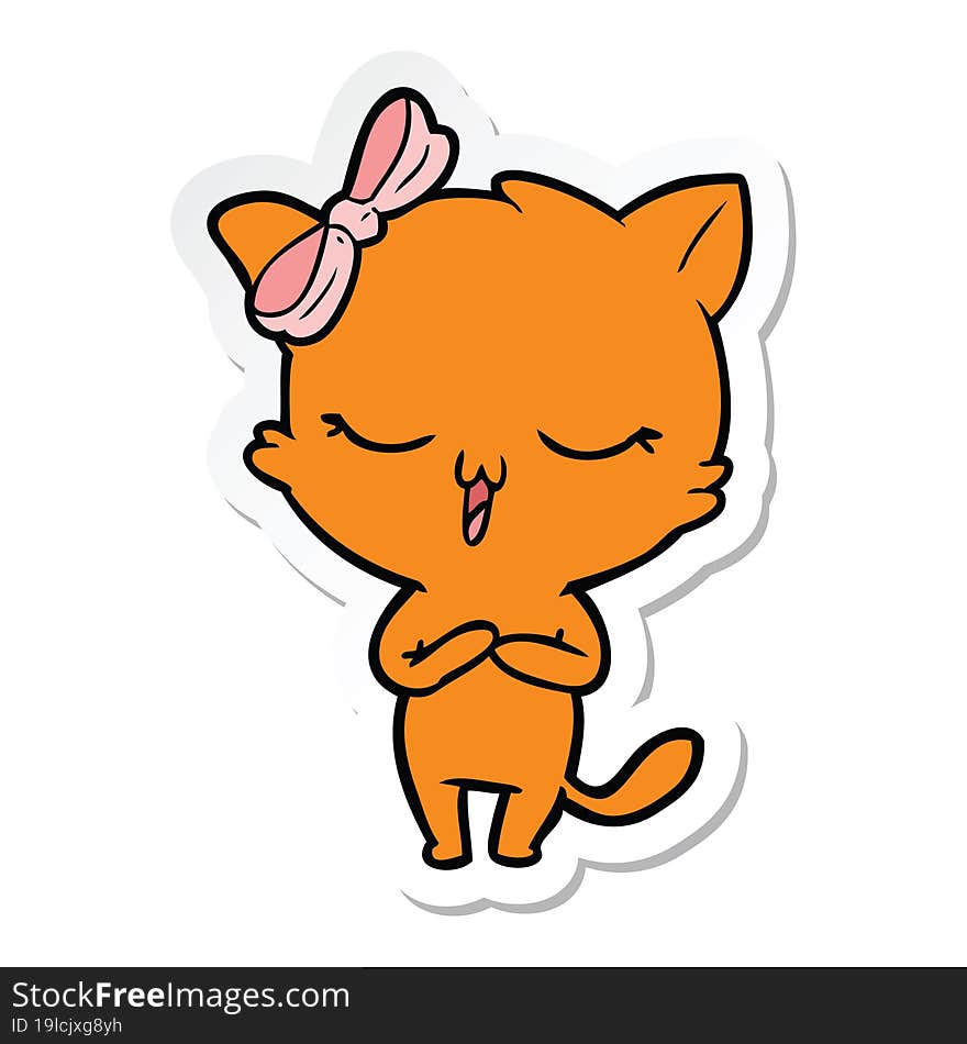 sticker of a cartoon cat with bow on head