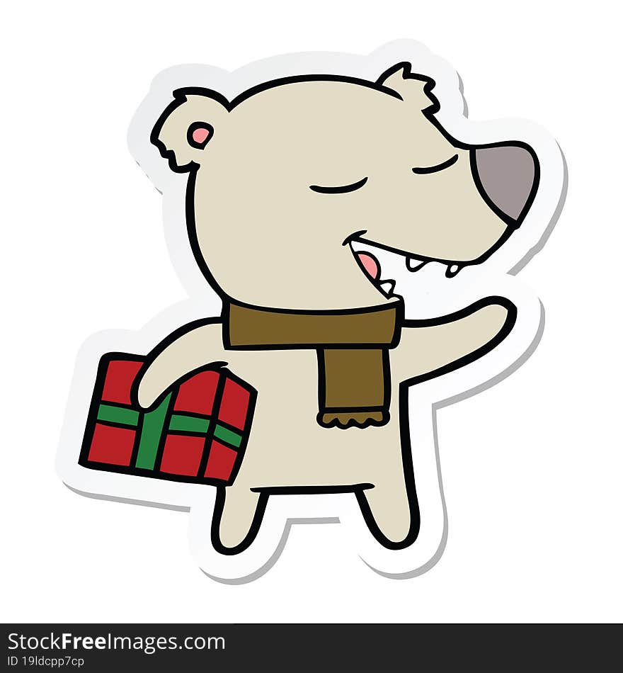 sticker of a cartoon bear with present