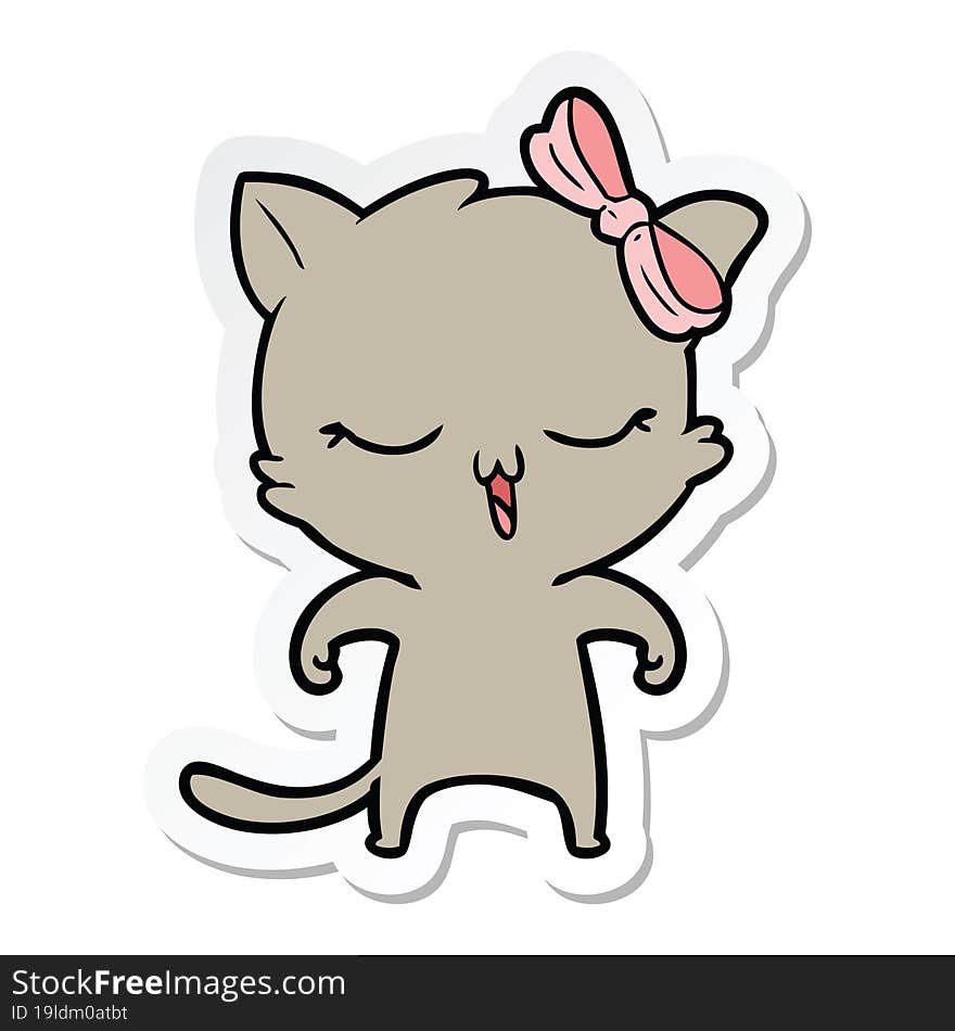 sticker of a cartoon cat with bow on head