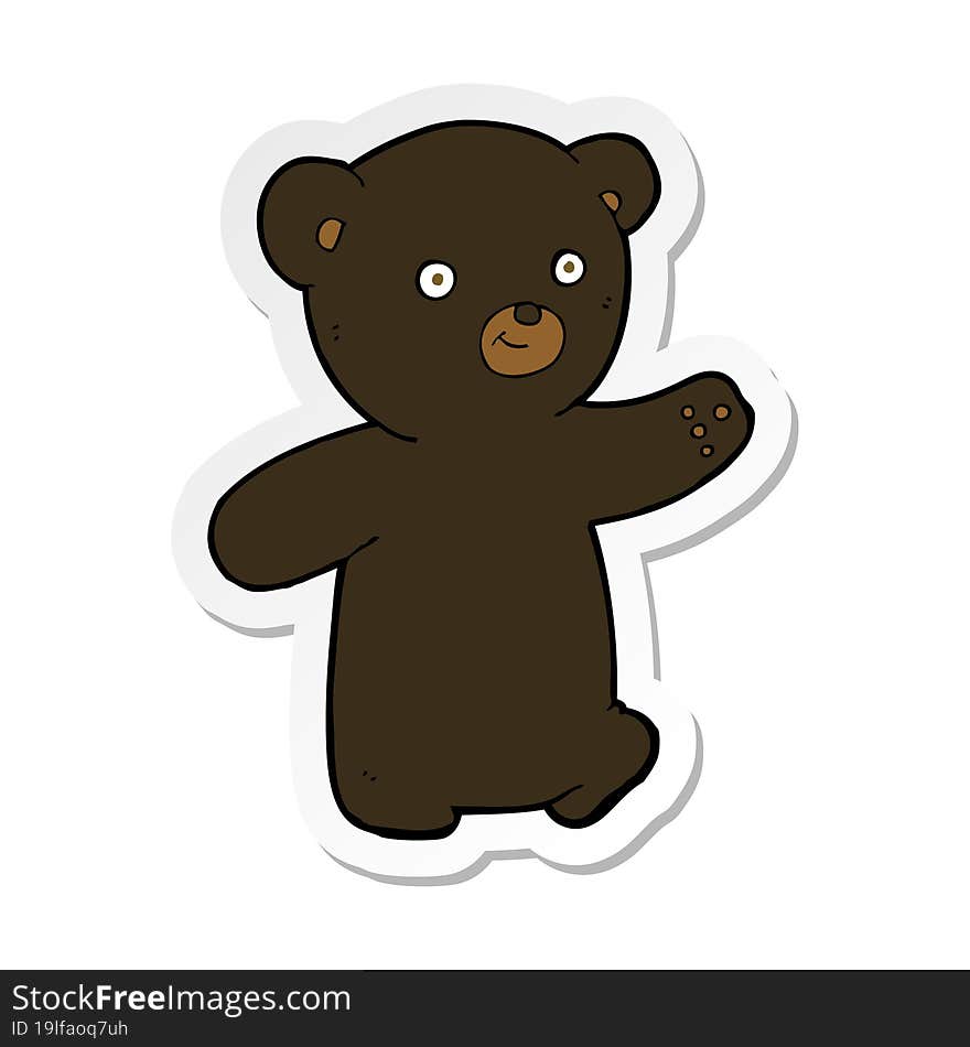 sticker of a cartoon black bear cub