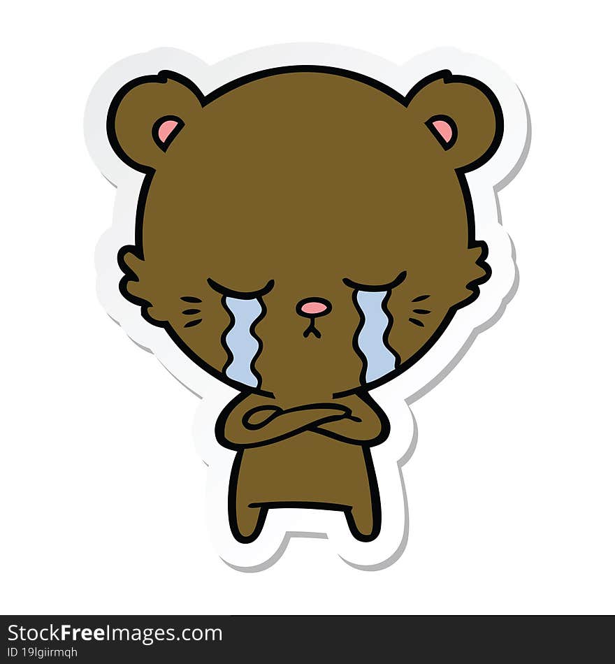 sticker of a crying cartoon bear