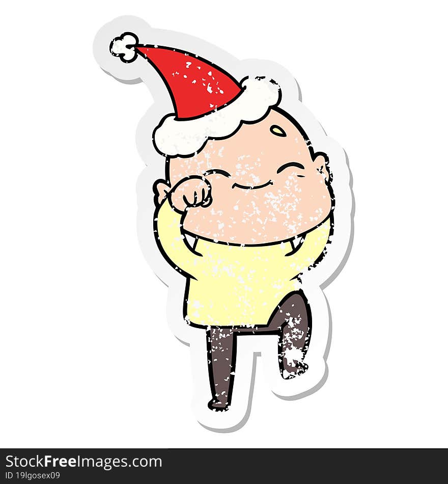 Happy Distressed Sticker Cartoon Of A Bald Man Wearing Santa Hat