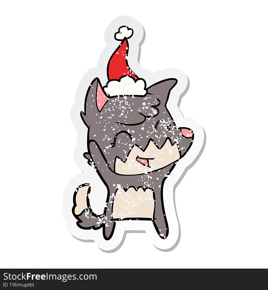 happy distressed sticker cartoon of a fox wearing santa hat