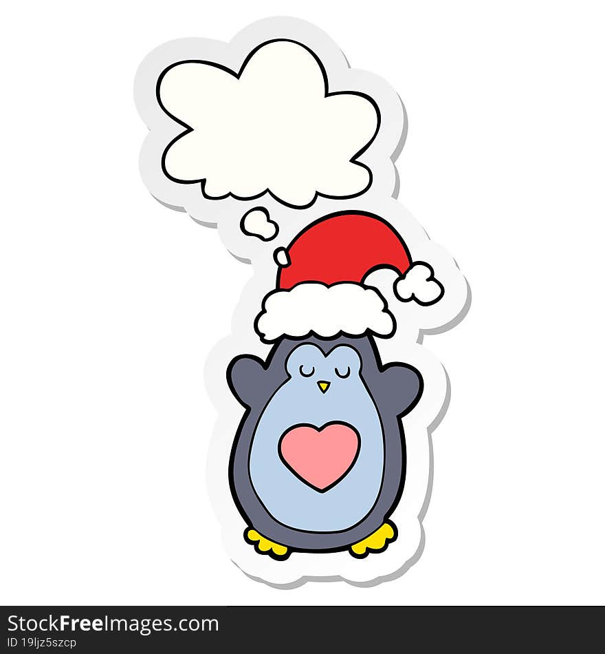 cute christmas penguin and thought bubble as a printed sticker