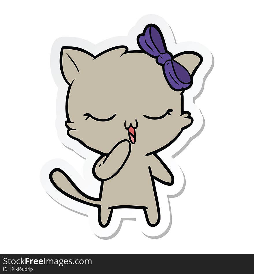 sticker of a cartoon cat with bow on head