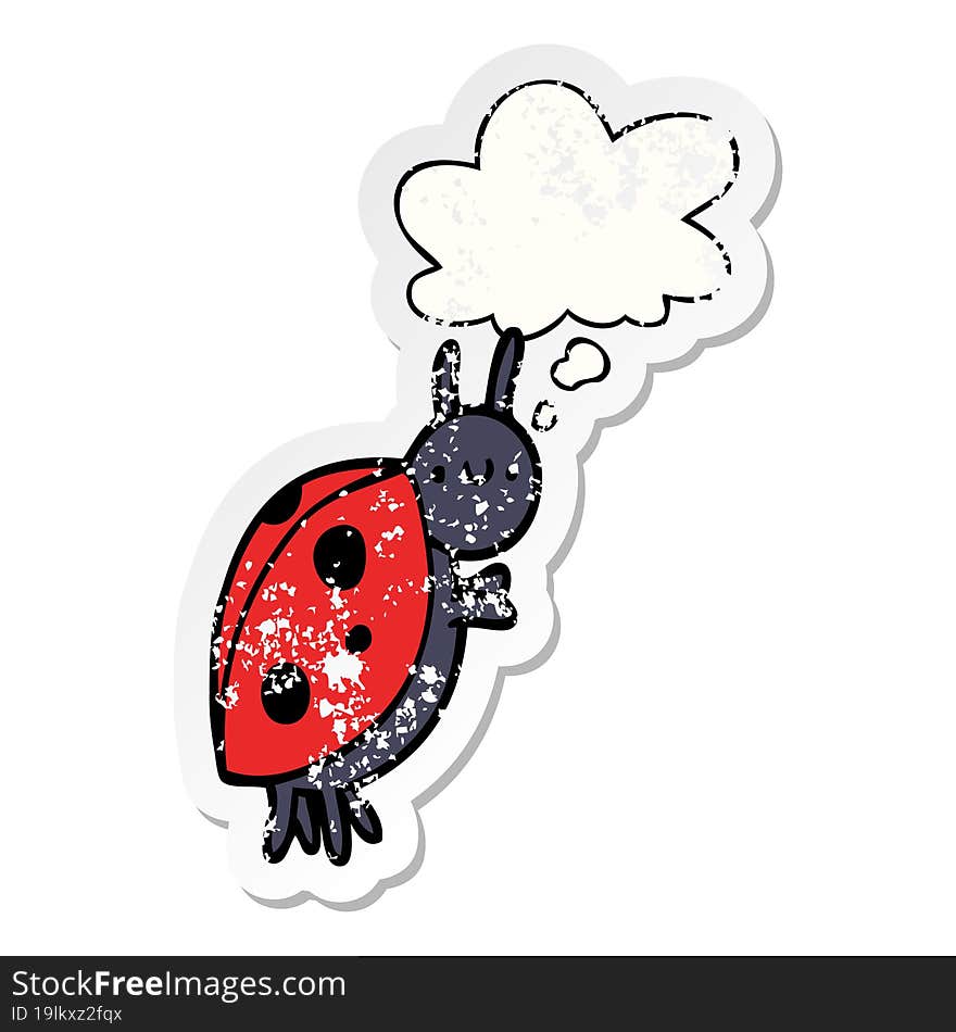 cartoon ladybug with thought bubble as a distressed worn sticker