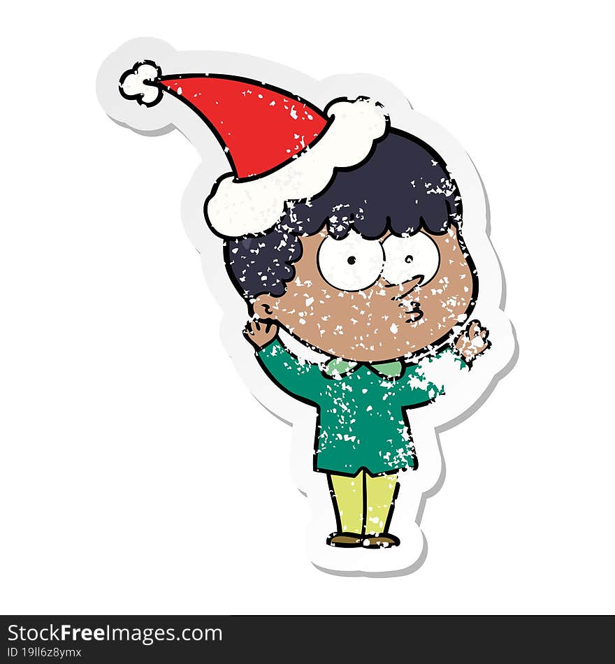 distressed sticker cartoon of a curious boy wearing santa hat