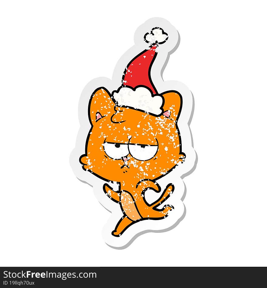 bored distressed sticker cartoon of a cat wearing santa hat