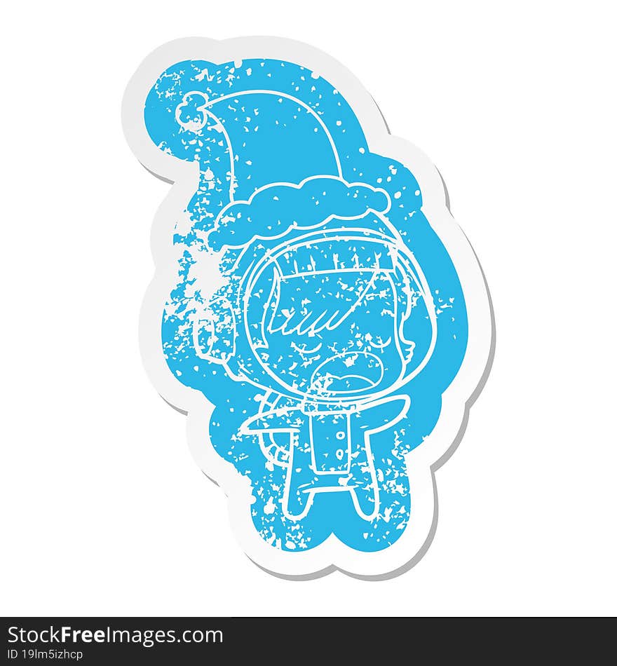 cartoon distressed sticker of a talking astronaut woman wearing santa hat