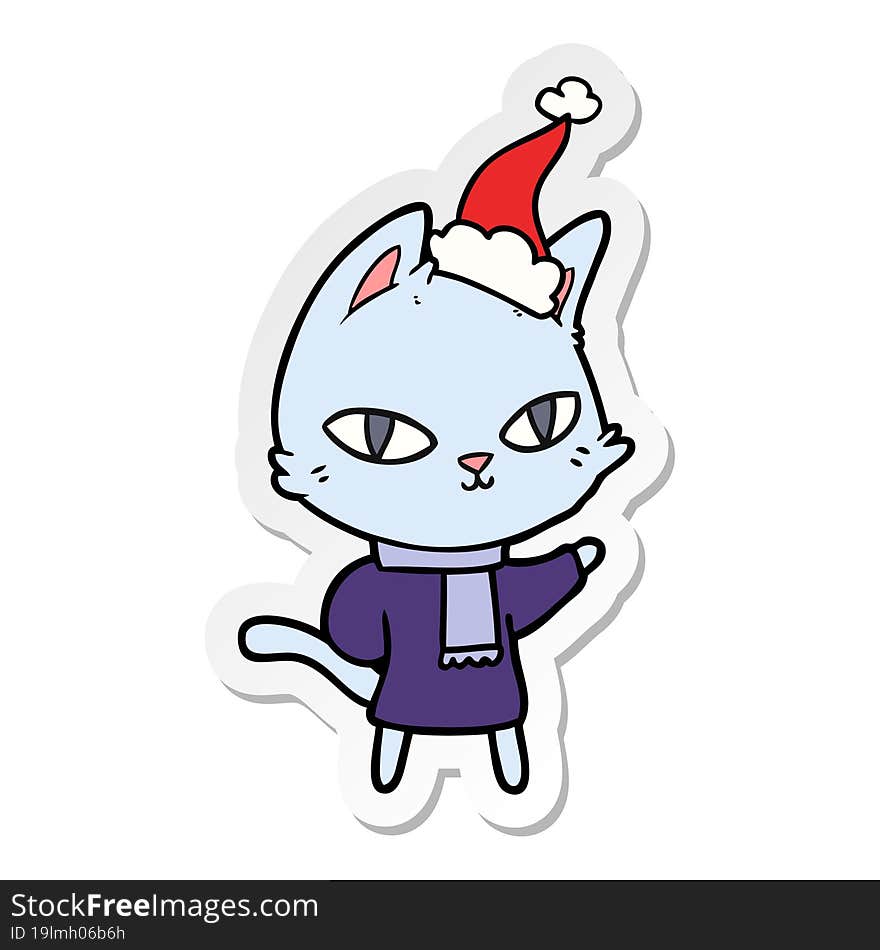 sticker cartoon of a cat staring wearing santa hat