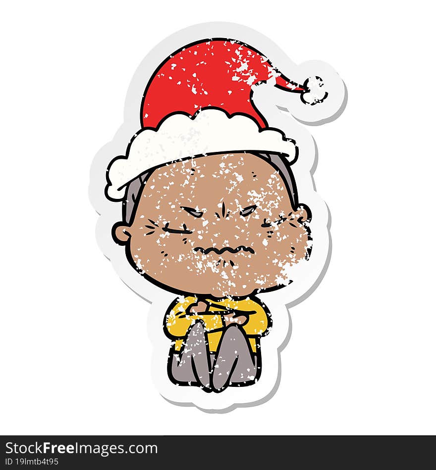 hand drawn distressed sticker cartoon of a annoyed old lady wearing santa hat