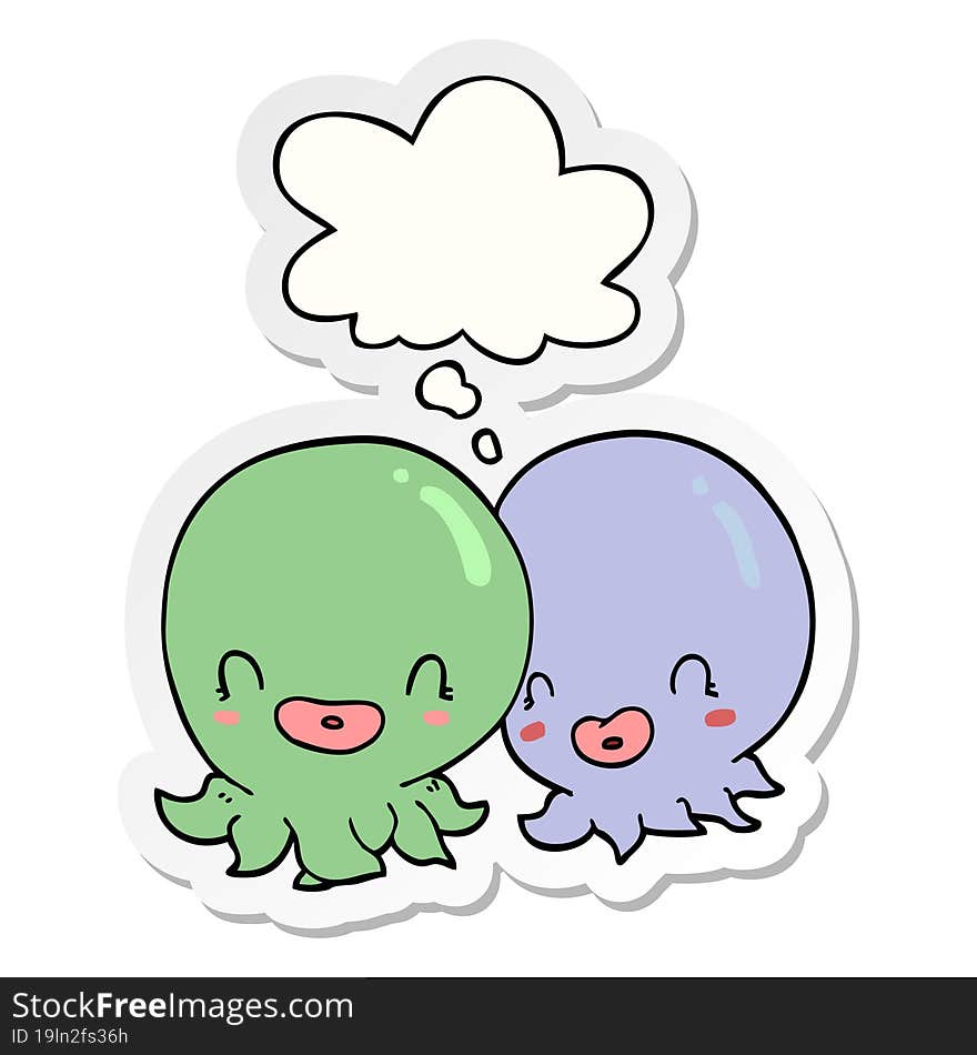 two cartoon octopi  and thought bubble as a printed sticker