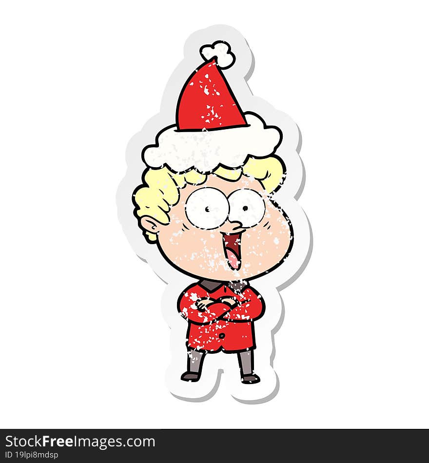 distressed sticker cartoon of a happy man wearing santa hat