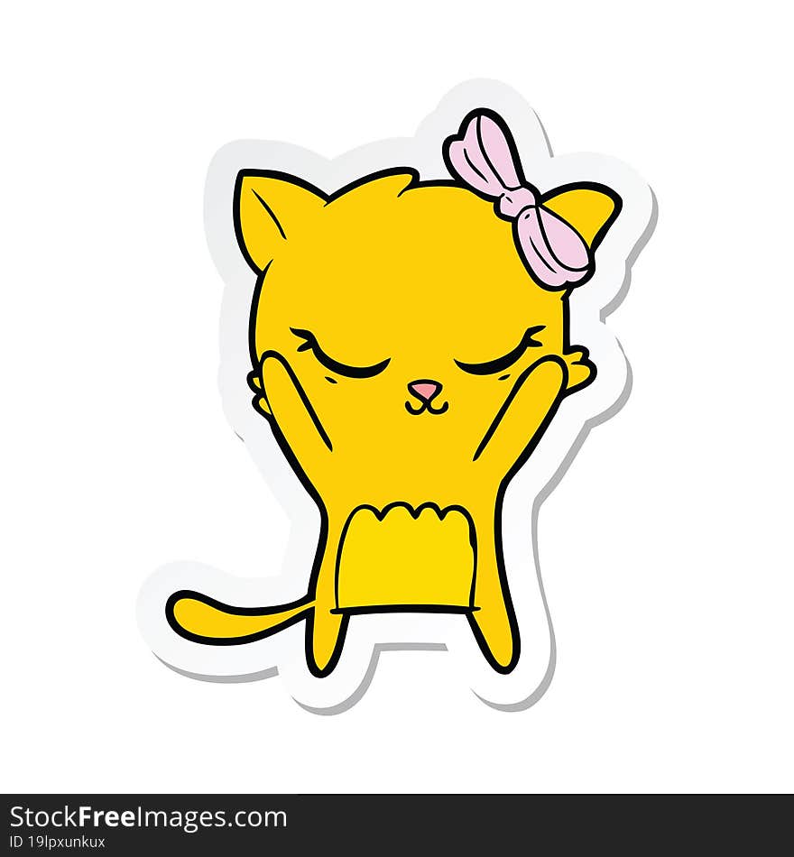 sticker of a cute cartoon cat with bow