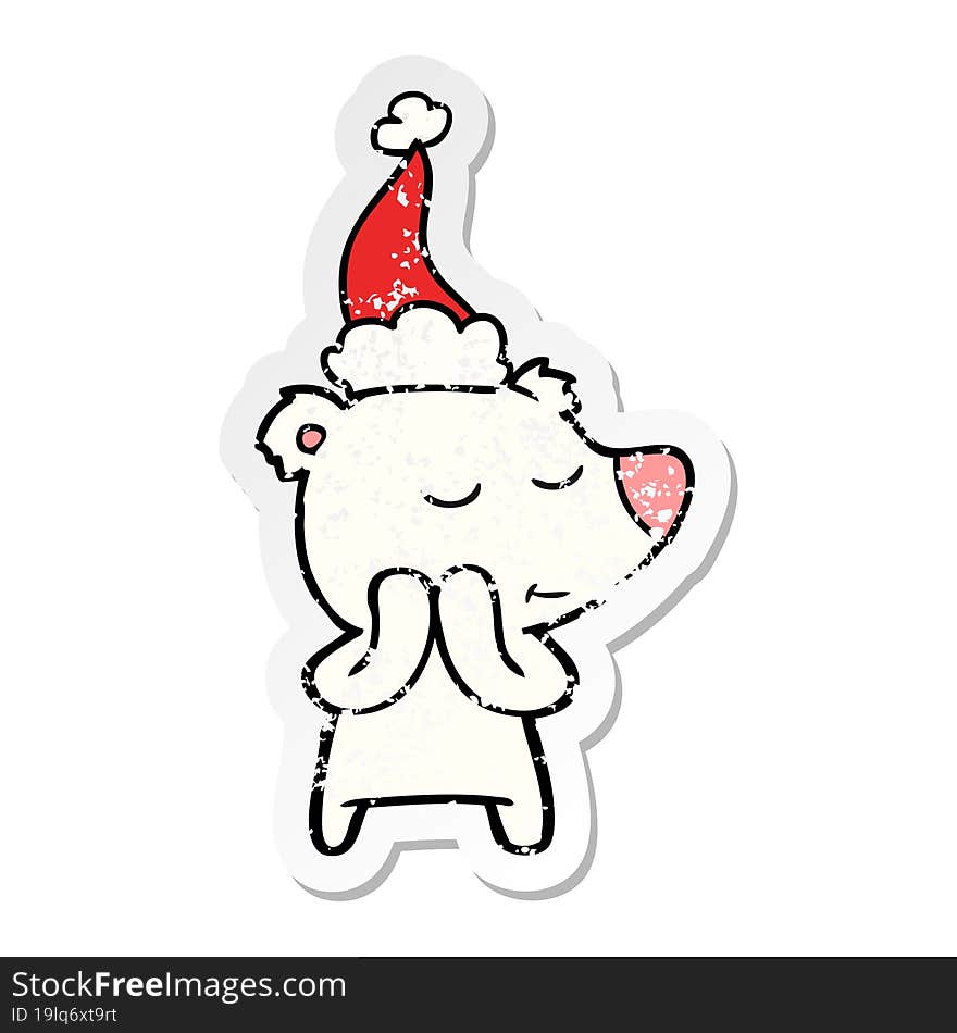 happy distressed sticker cartoon of a polar bear wearing santa hat