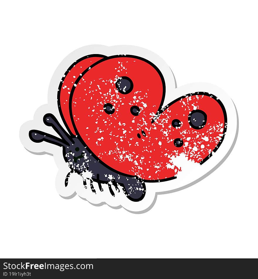 distressed sticker of a quirky hand drawn cartoon butterfly