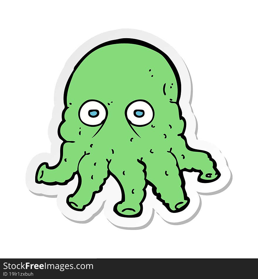 sticker of a cartoon alien squid face