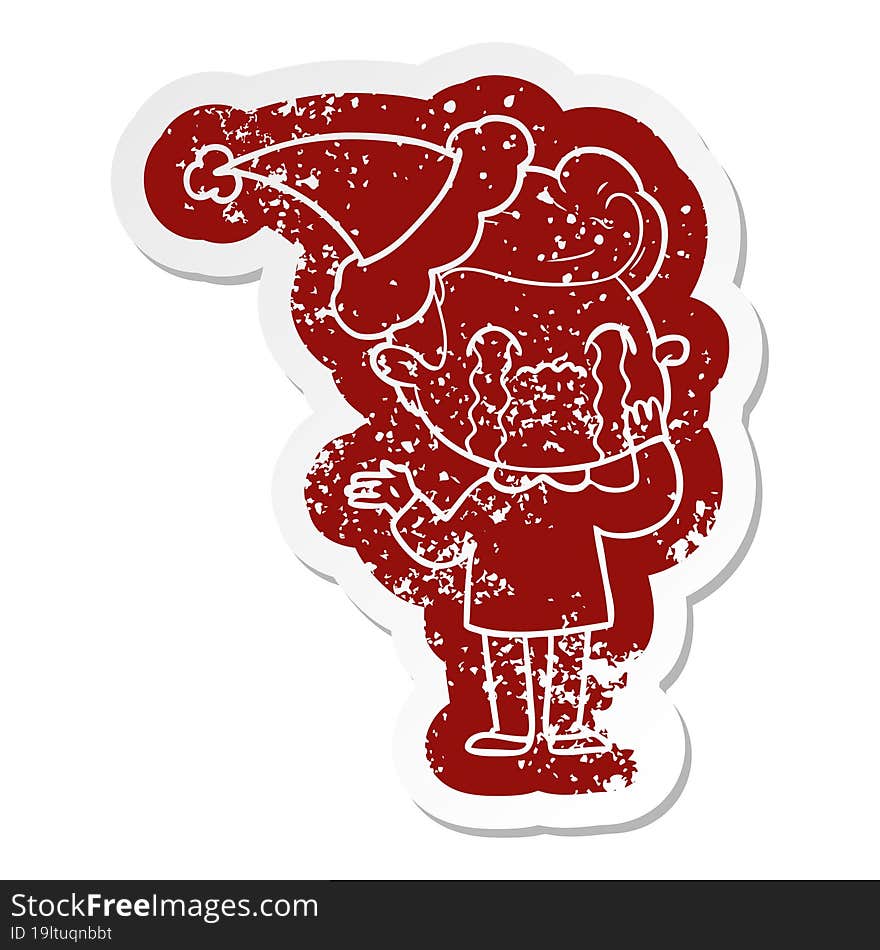 quirky cartoon distressed sticker of a man crying wearing santa hat