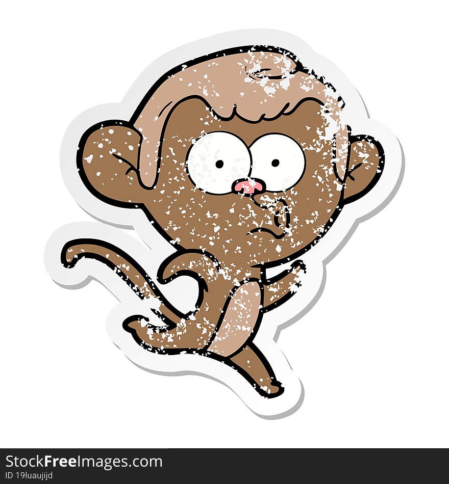 distressed sticker of a cartoon surprised monkey